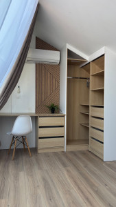 Photo de galerie - Création d’un dressing et bureau sur mesure 