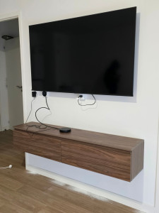 Photo de galerie - Installation support tv murale et meuble suspendu 