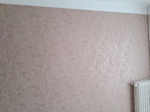 Photo de galerie - Posé de tapisserie sur 1 pan de mur 