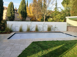 Photo de galerie - Realisation cloture brise vue en fibro ciment et couvertine en alu