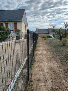 Photo de galerie - Pose d'une clôture rigide...