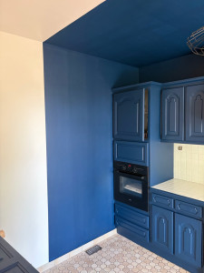 Photo de galerie - Séparation bleu, beige cuisine
