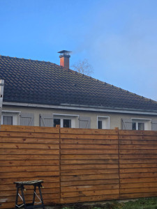 Photo de galerie - Bardage bois en remplacement de tuyas 