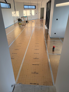 Photo de galerie - Pose sous couche et stratifié 85m2