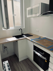 Photo de galerie - Pose de cuisine avec Parquet 