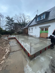 Photo de galerie - Réalisation d'un dalle béton pour une extension de maison