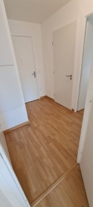 Photo de galerie - Installation de parquet flottant dans l'ensemble des appartements de la résidence.