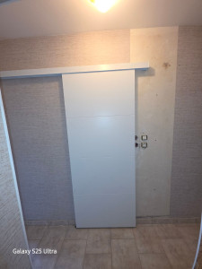 Photo de galerie - La pose d'une porte coulissants 