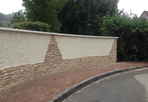 Photo de galerie - Facade,de mur,projection à la chaux pierre sculpté et teinte (fausse pierres sculpté sur chaux)