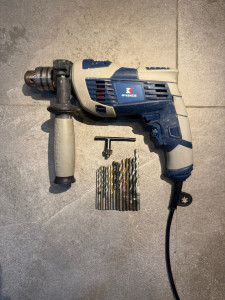 Photo de galerie - Perceuse à percussion 1010W avec forets 