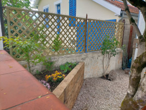 Photo de galerie - Construction jardinières bois, pose panneaux bois 