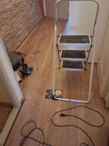 Photo de galerie - Pose d'un parquet flottant stratifié.