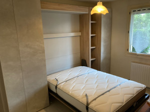 Photo de galerie - Installation d’un lit pont relevable avec dressing et biblio 