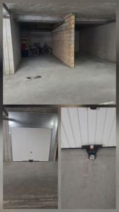 Photo de galerie - Séparation des places et pose porte de garage avec habillage galvanisé.