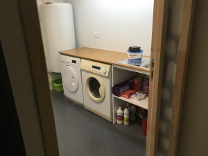 Photo de galerie - Pose de sol et aménagement buanderie 