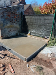 Photo de galerie - Coullage dalle béton plus bordure 