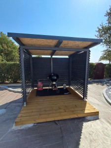 Photo de galerie - Réalisation d'un kiosque pour barbecue. 