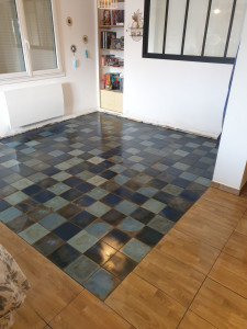 Photo de galerie - Pose de 20x20 dans un salon 