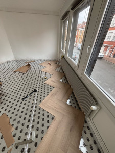 Photo de galerie - Pose d’un parquet rompus 