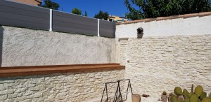 Photo de galerie - Aménagement du dessus de muret en lame de terrasse 