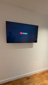 Photo de galerie - Fixation d'une TV au mur