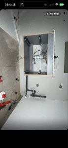 Photo de galerie - Pose d’un meuble vasque avec mitigeur, réalisation des alimentations en eau, évacuation et raccordements sanitaires.