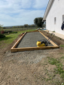 Photo de galerie - Réalisation d’un terrain de pétanque finition diorite 