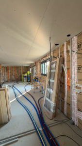 Photo de galerie - Pose d’une ossature s47+mise en place d’un isolant (laine de verre  gr32) en 140mm