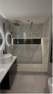 Photo de galerie - Rénovation complète de salle de bain – préparation, pose carrelage et installation sanitaire.