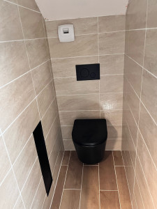 Photo de galerie - Création d’une salle d’eau ( conception, carrelage ,…),Pose d’un WC suspendu, intégration d’une niche 