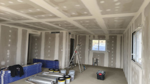 Photo de galerie - Ponçage et peinture d'une maison neuve.