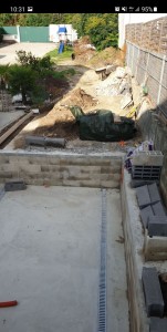 Photo de galerie - Décaissement de terrain, création d'une dalle ciment avec escalier.
