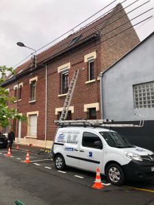 Photo de galerie - Intervention centre-ville de Lens remise en état du chéneaux