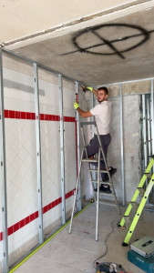 Photo de galerie - Montage rails local commercial 170m2