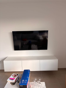 Photo de galerie - Pose de télévision et meuble sur un mur 