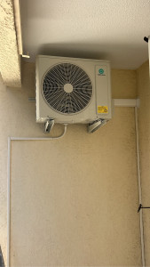 Photo de galerie - Installation groupe extérieur heiwa