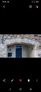 Photo de galerie - Reprise de linteau, joints pierres apparentes 