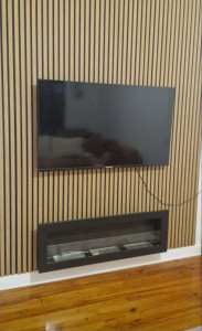 Photo de galerie - Mise en place déco type tasseau, fixatio TV et cheminé 