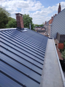 Photo de galerie - Remise à neuf d'une toiture en tôle bac acier isolé