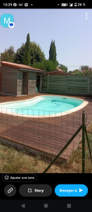 Photo de galerie - Terrasse piscine après intervention ponçage et lasure de l'intégralité de la terrasse garantie 10 ans