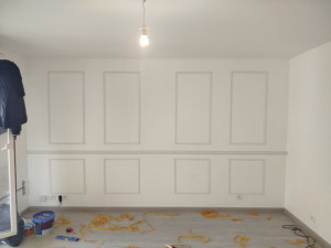 Photo de galerie - Installation de panneaux de bois sur le mur 