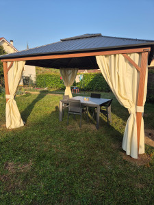 Photo de galerie - Pose d’une tonnelle allu réalisation de 4 plots béton 