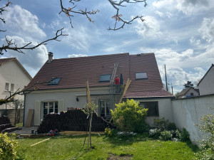 Photo de galerie - Réalisation d’une couverture en tuiles mécanique