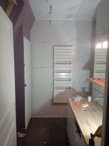 Photo de galerie - Installation chauffage et faïence salle de bain complète sol et mur 