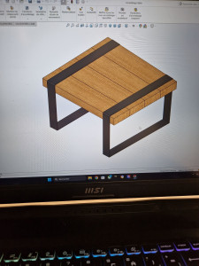 Photo de galerie - Maquette 3D d'une table. 