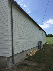 Photo de galerie - Pose de clin sur façade 