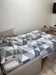 Photo de galerie - Lit de chambre fait 