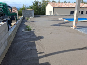 Photo de galerie - Réalisation d'une dalle béton pour terrasse.