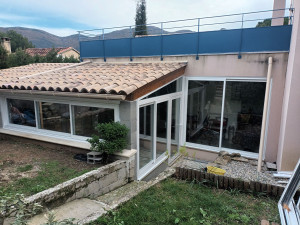 Photo de galerie - Pose fermeture terrasse style Véranda 
