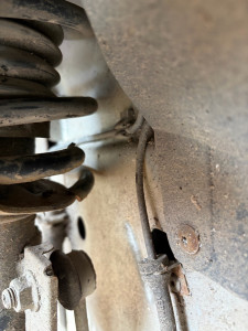 Photo de galerie - Changement d'un amortisseur ( ressort sectionné)